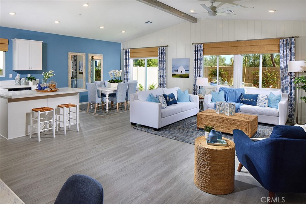 28484 Memory Lane Winchester, CA 92596 - Photo 4 of 12 a living room with furniture wooden floor and a large window