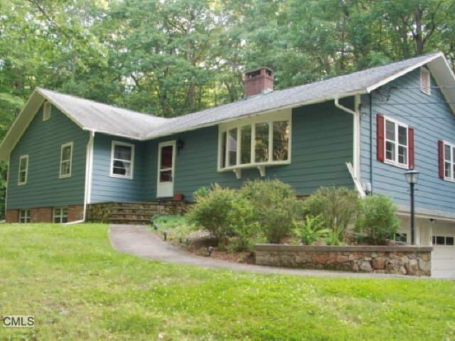 246 Hattertown Road Newtown, CT 06470 - Photo 1 of 1 front view of a house with a yard