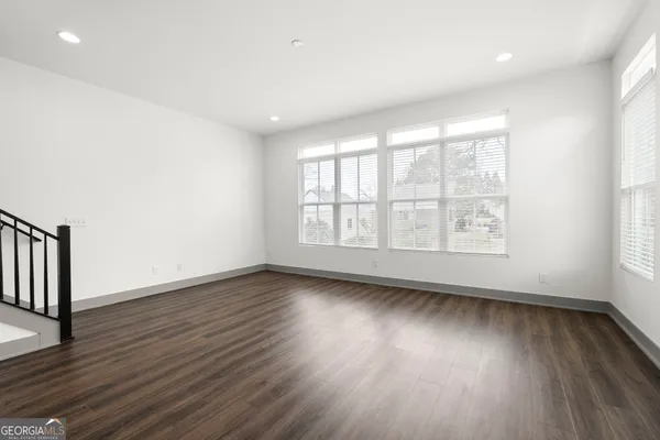 a view of kitchen and wooden floor