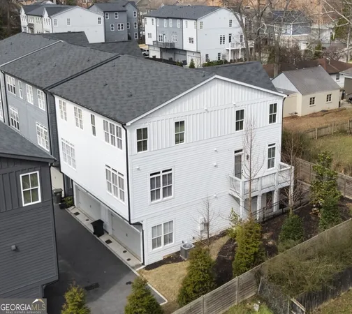 a view of a house with yard and staircase