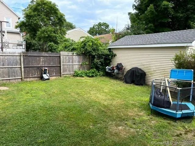 a view of backyard with slide