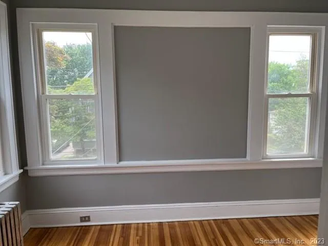 a view of a room that has a window in it