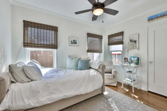 a bed room with a bed and a window