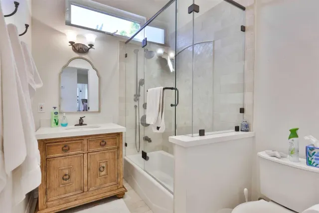 a bed room with a bed and a window