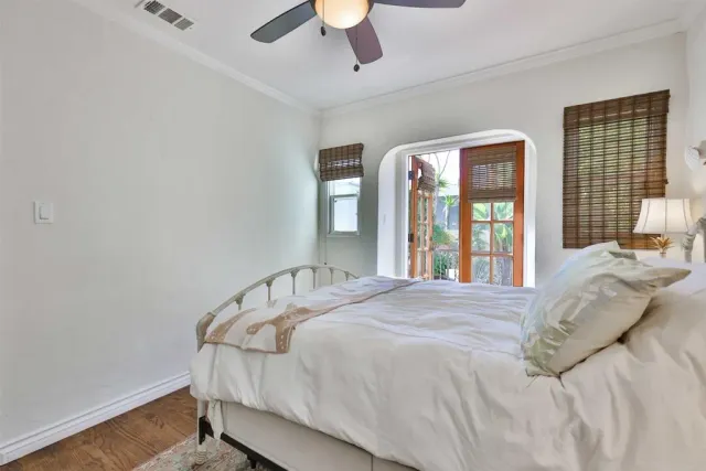 a view of a chairs and table in backyard