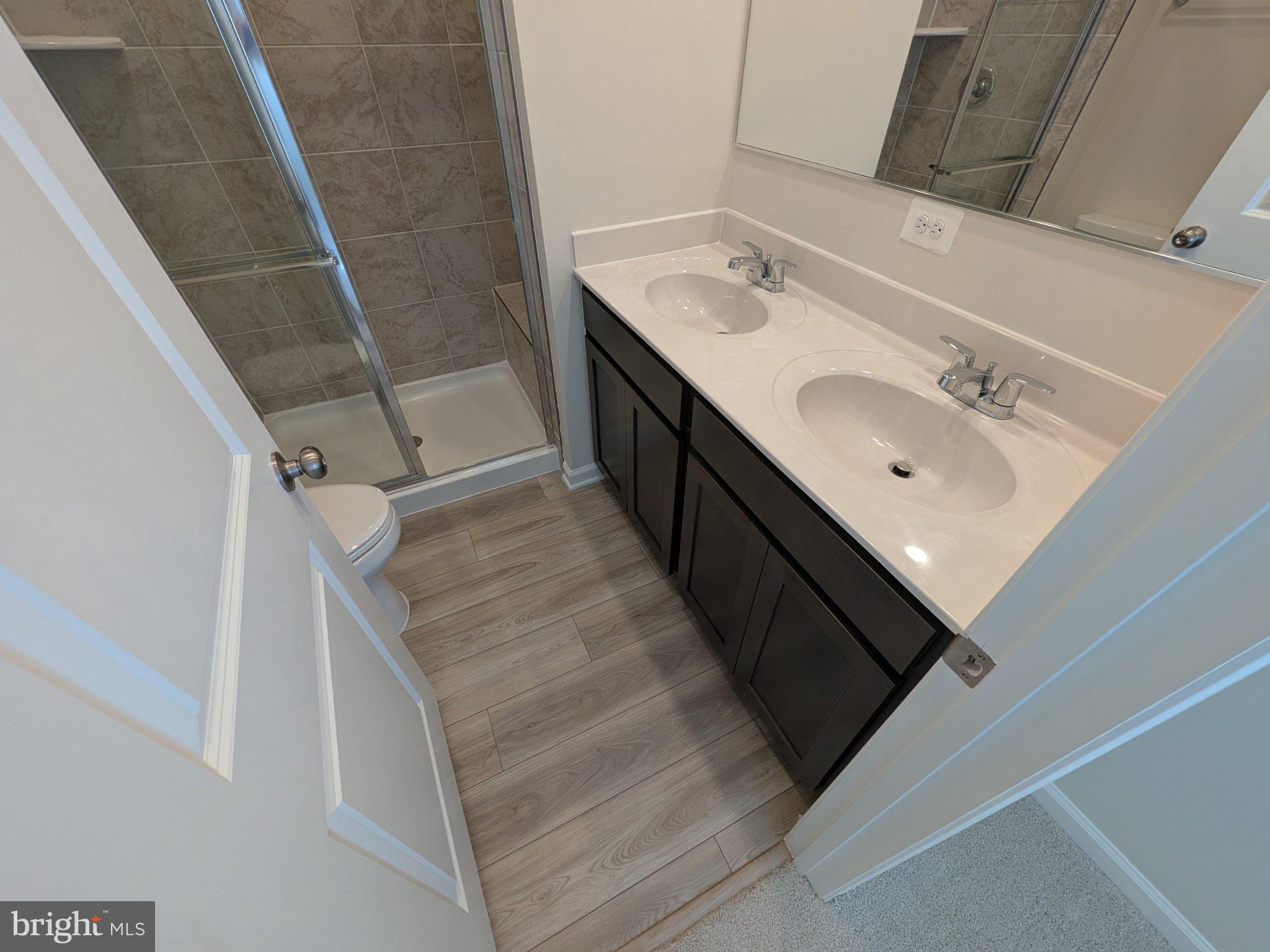 278 Swan Fld Avenue Ranson, WV 25438 - Photo 26 of 33 Sleek dual vanity in modern bath.