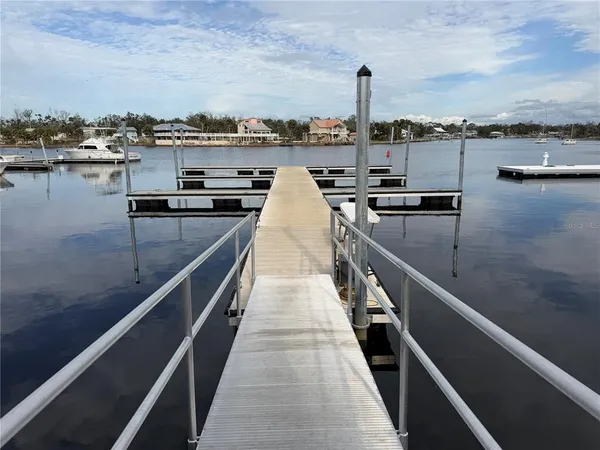 a front view of a house with a lake view