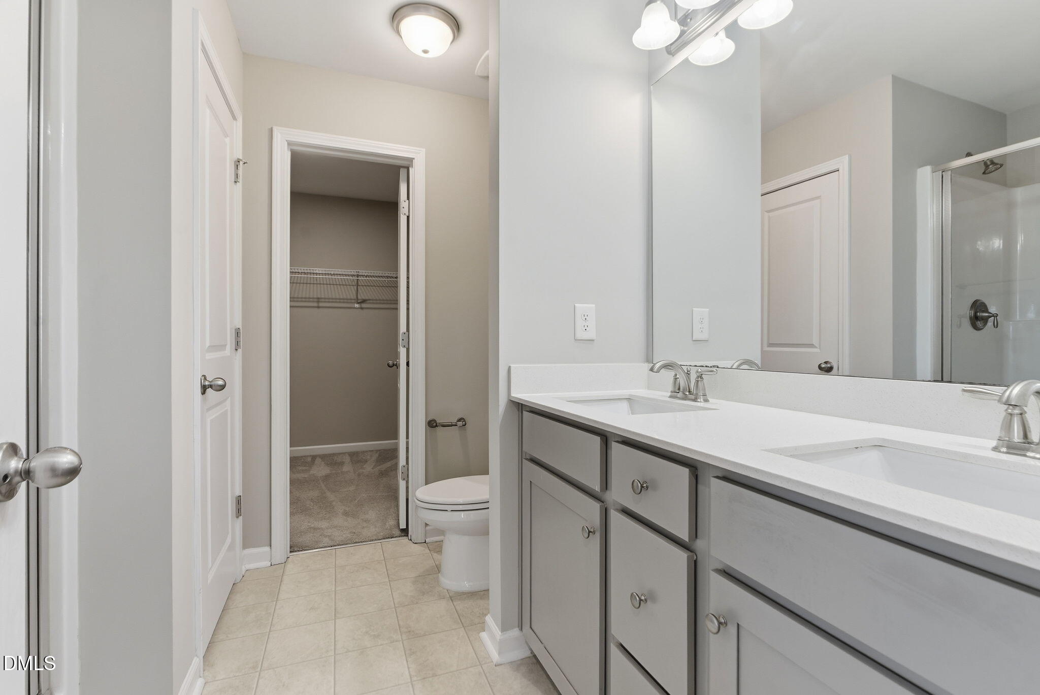 48 Weathervane Dr. Zebulon, NC 27597 - Photo 36 of 68 a bathroom with a sink a toilet and shower