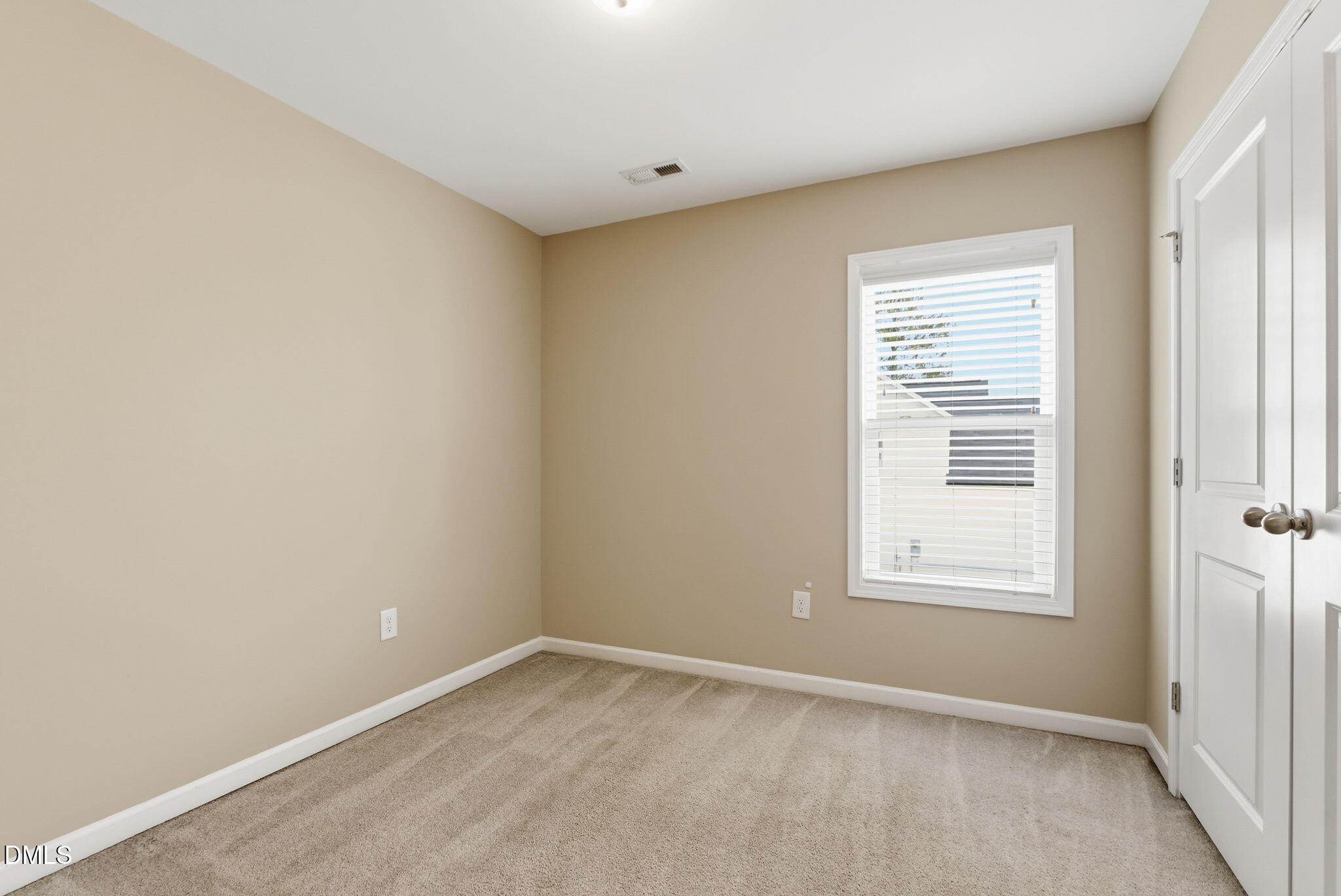 48 Weathervane Dr. Zebulon, NC 27597 - Photo 42 of 68 an empty room with a window