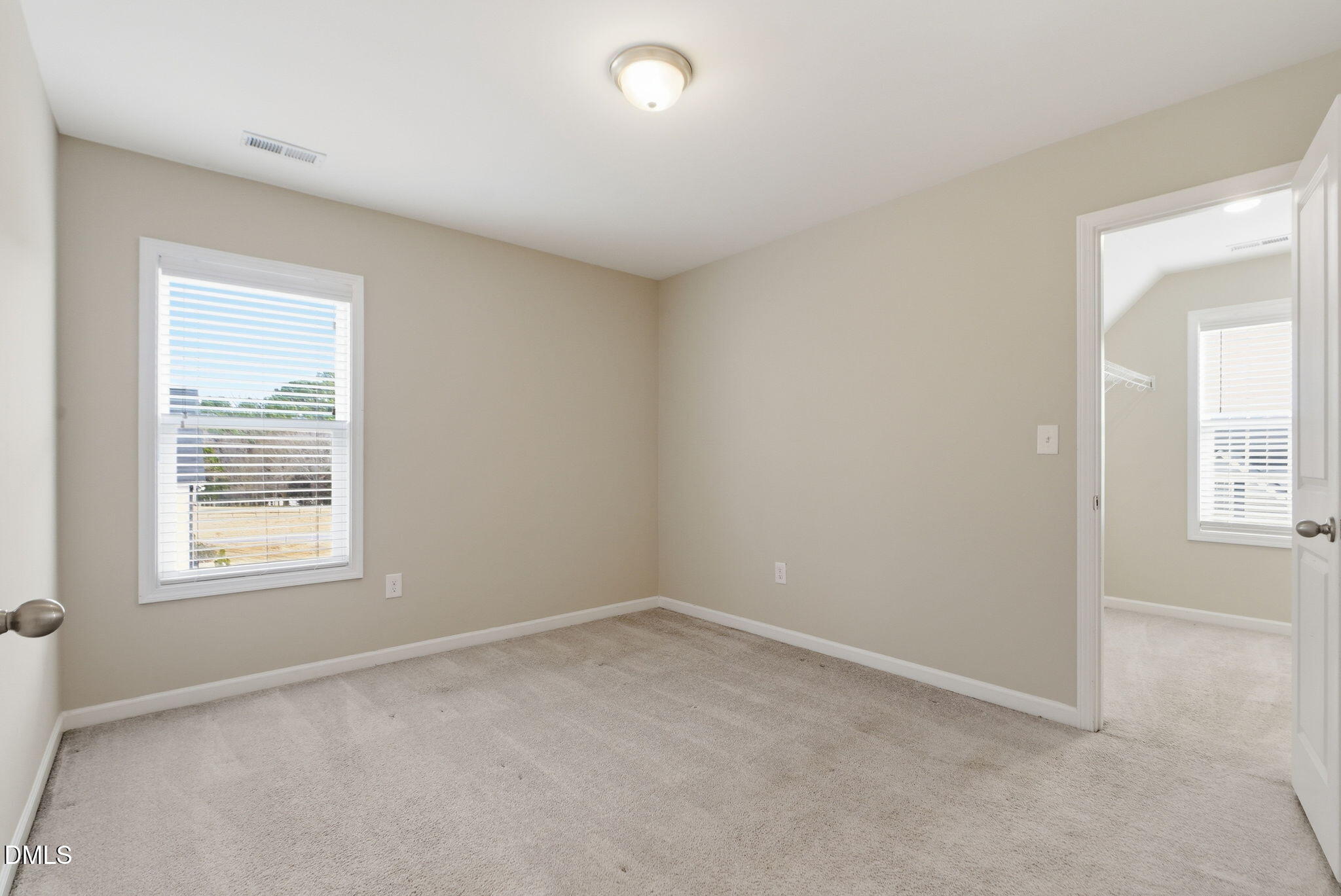 48 Weathervane Dr. Zebulon, NC 27597 - Photo 44 of 68 an empty room with a window