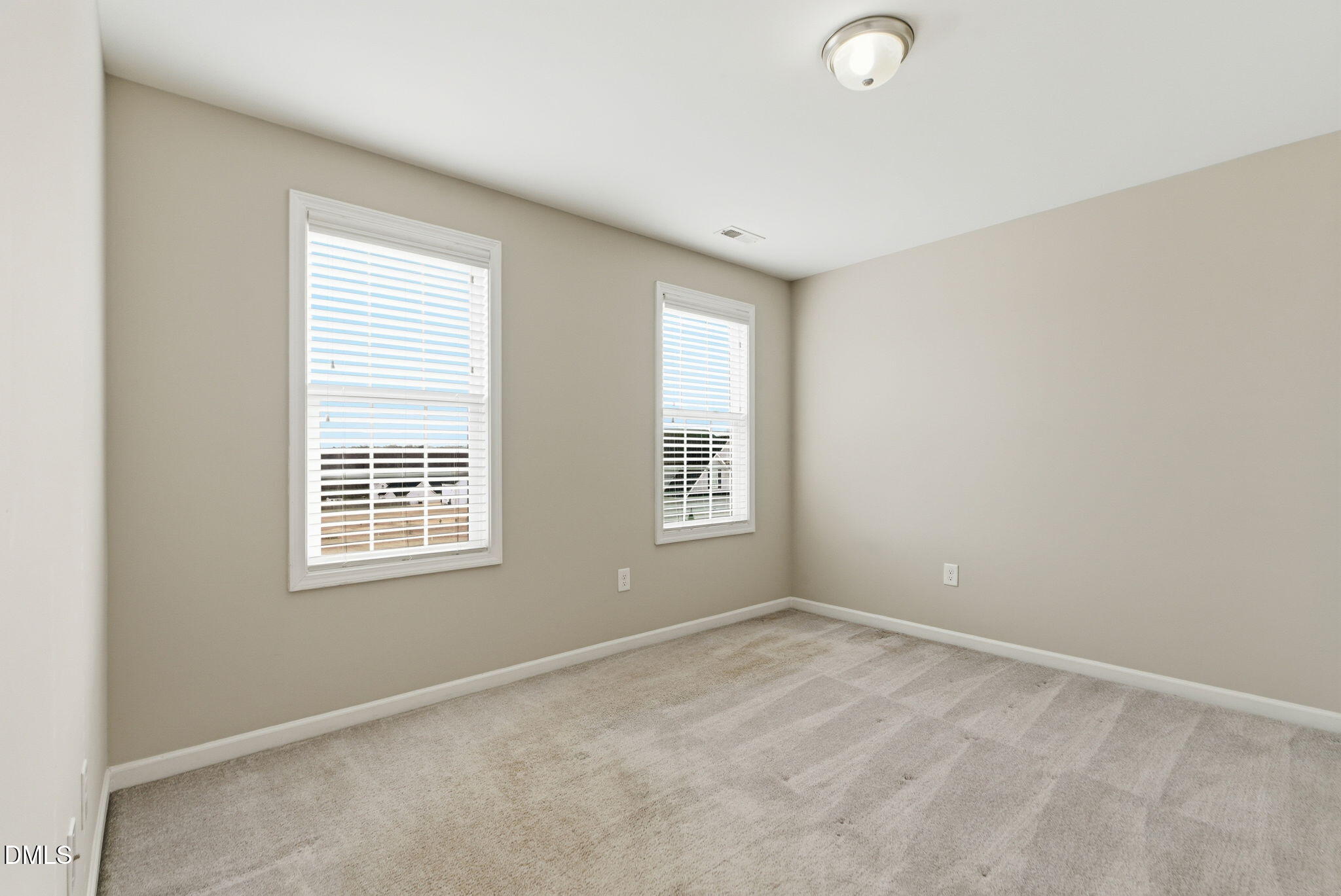 48 Weathervane Dr. Zebulon, NC 27597 - Photo 48 of 68 a view of an empty room with a window