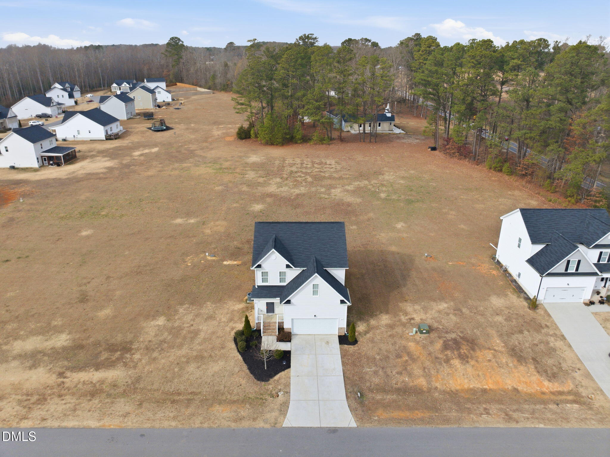 48 Weathervane Dr. Zebulon, NC 27597 - Photo 57 of 68 a view of outdoor space and yard