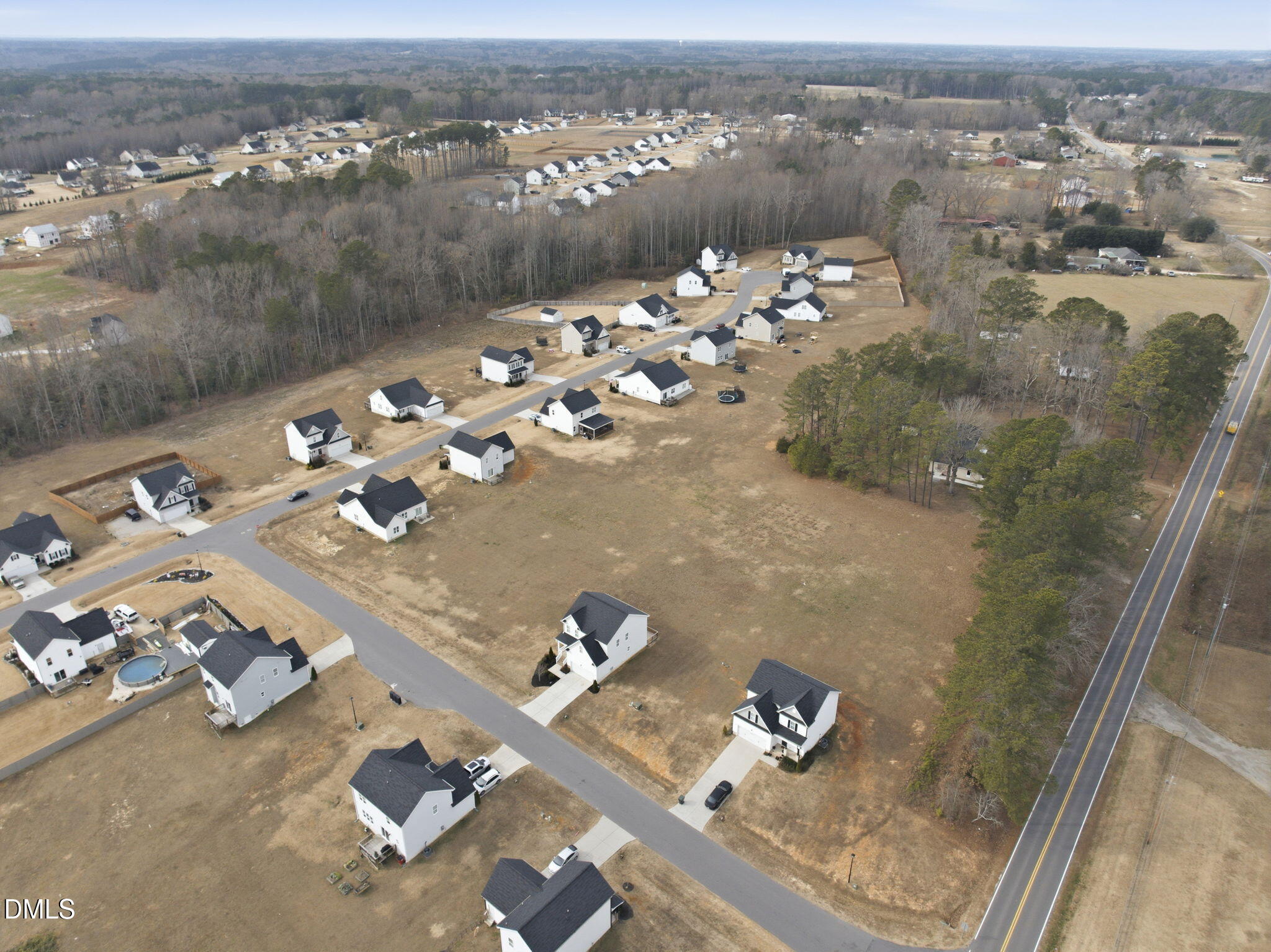 48 Weathervane Dr. Zebulon, NC 27597 - Photo 60 of 68 an aerial view of a house with yard