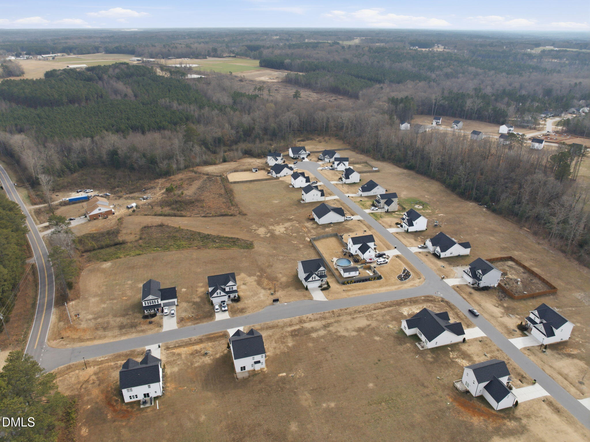 48 Weathervane Dr. Zebulon, NC 27597 - Photo 63 of 68 an aerial view of a house with outdoor space