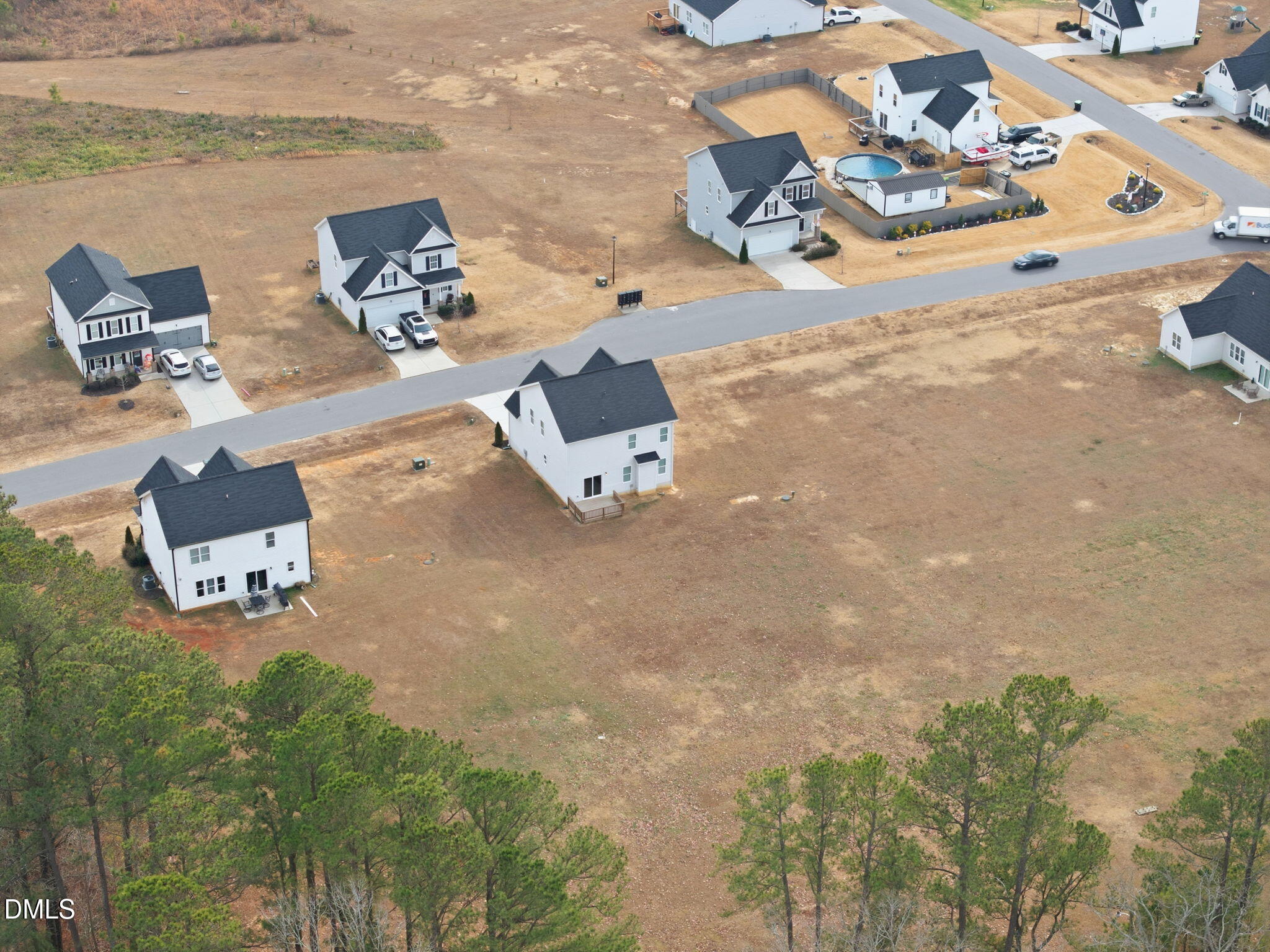 48 Weathervane Dr. Zebulon, NC 27597 - Photo 64 of 68 an aerial view of a house with outdoor space