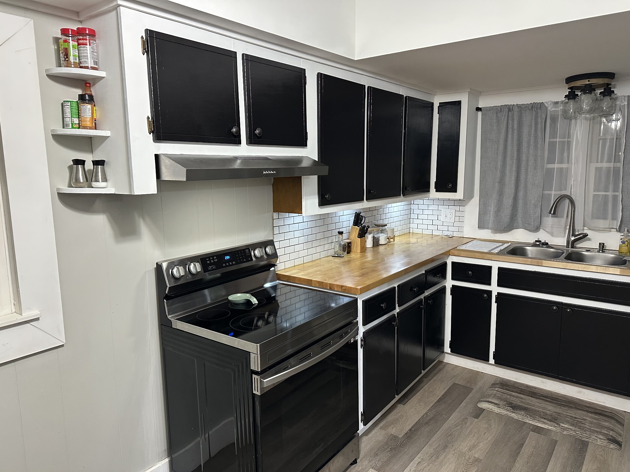2 Hardin Loop Westpoint, TN 38486 - Photo 17 of 27 a kitchen with a sink stove and cabinets