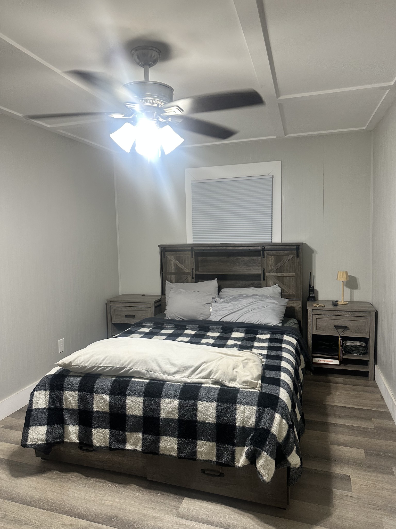 2 Hardin Loop Westpoint, TN 38486 - Photo 23 of 27 a bedroom with a bed a dresser with wooden floor