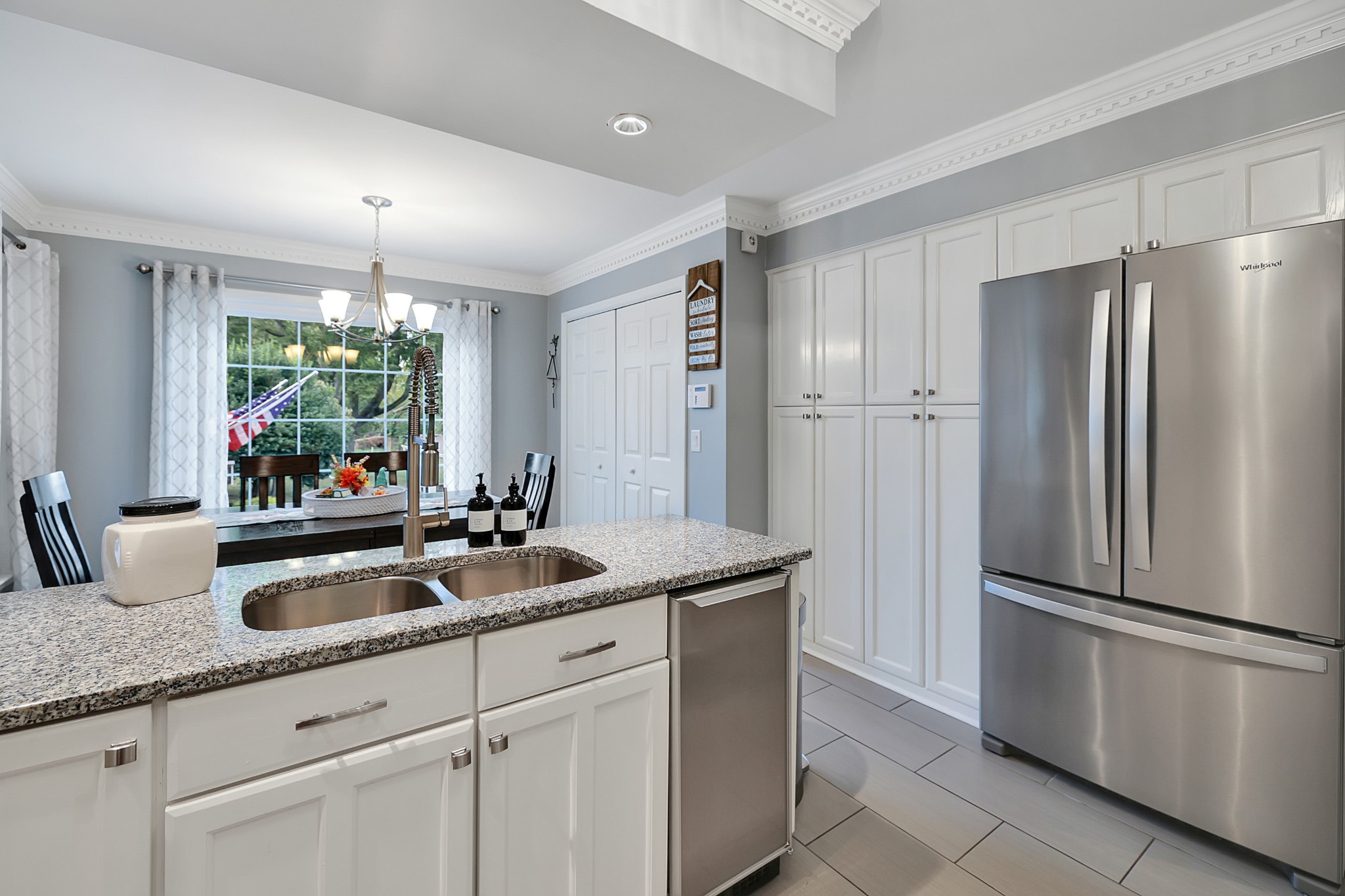 8122 Holly Road Brentwood, TN 37027 - Photo 22 of 65 a kitchen with stainless steel appliances granite countertop a refrigerator and a sink