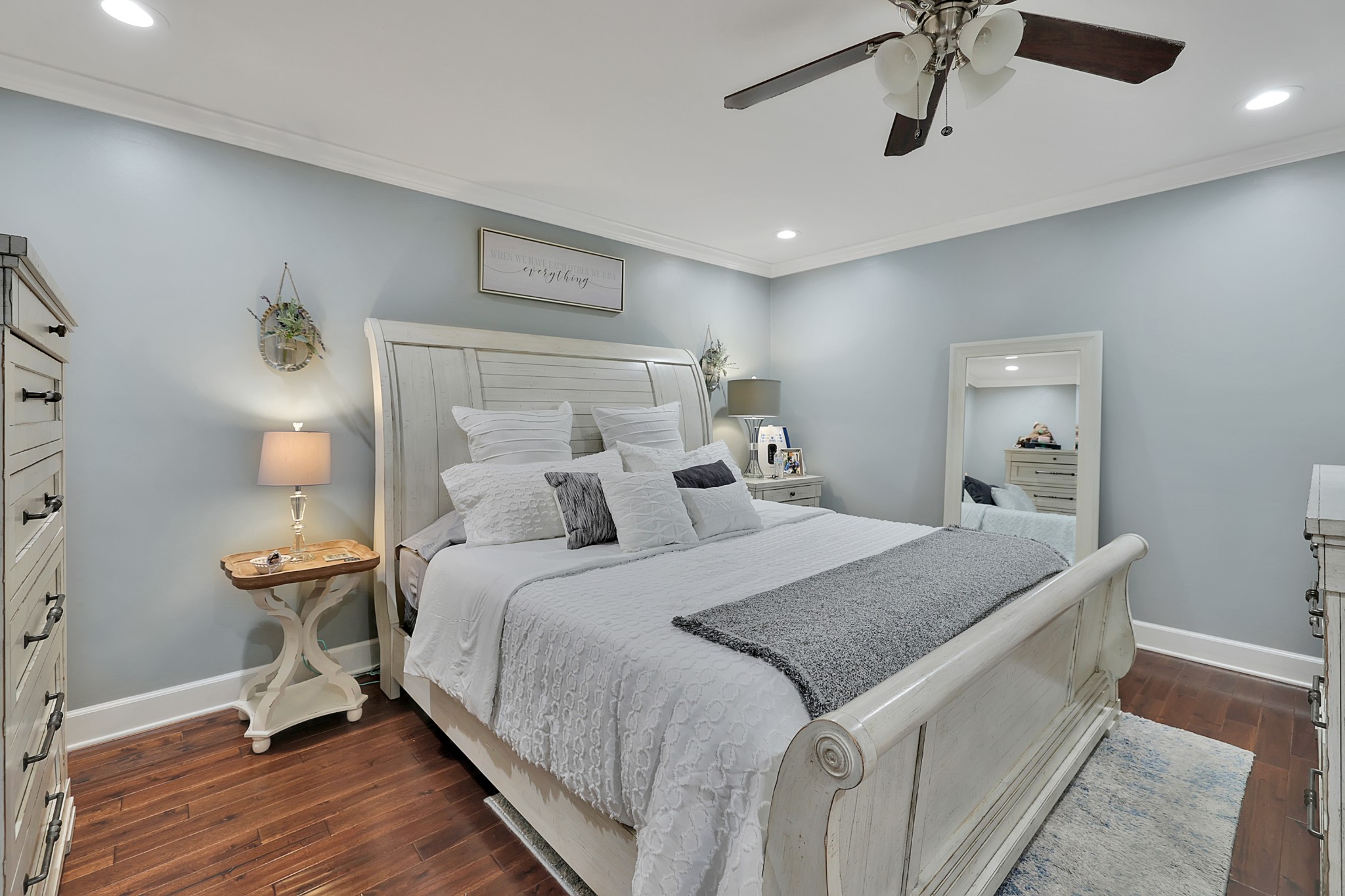 8122 Holly Road Brentwood, TN 37027 - Photo 28 of 65 a bed room with a bed and a chandelier