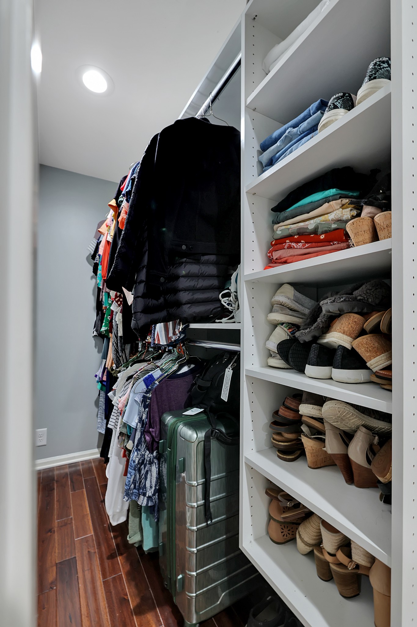 8122 Holly Road Brentwood, TN 37027 - Photo 30 of 65 a view of walk in closet with clothes and shoes