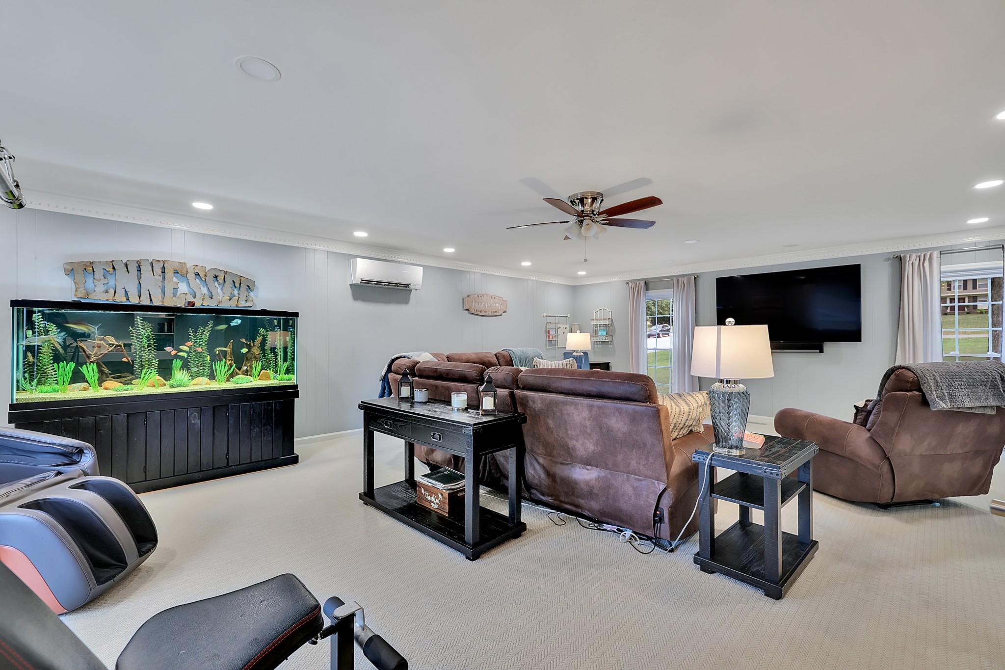8122 Holly Road Brentwood, TN 37027 - Photo 38 of 65 a living room with furniture and a flat screen tv