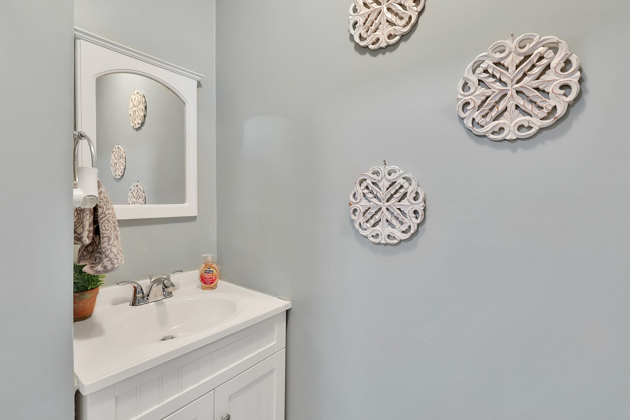 8122 Holly Road Brentwood, TN 37027 - Photo 41 of 65 a bathroom with a sink and a mirror