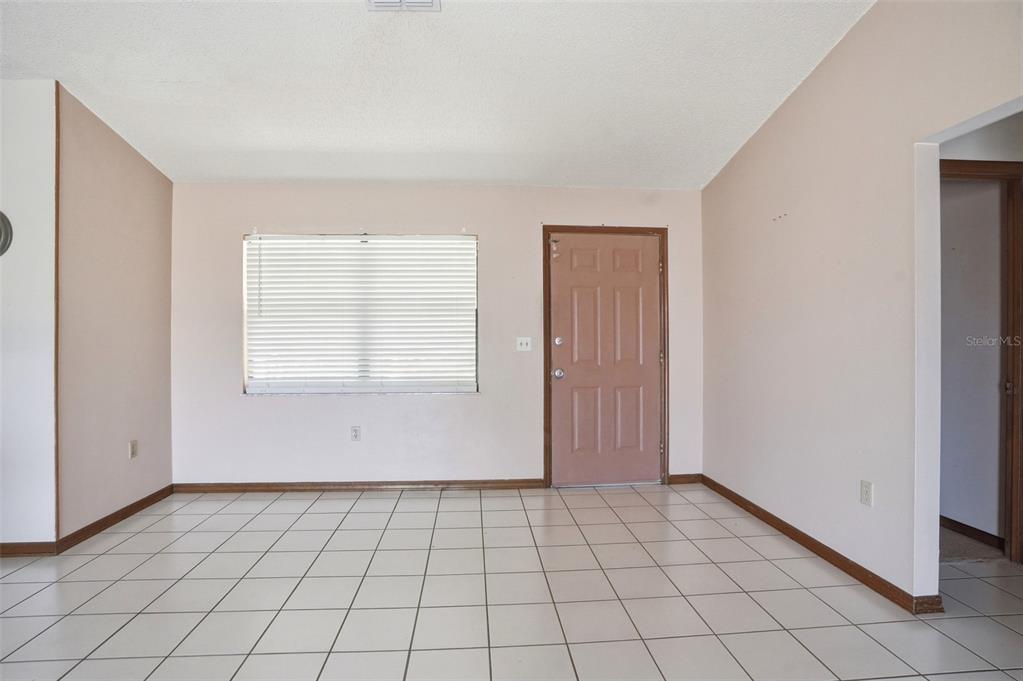 7443 Wabash Trail Spring Hill, FL 34606 - Photo 4 of 40 a view of an empty room and window