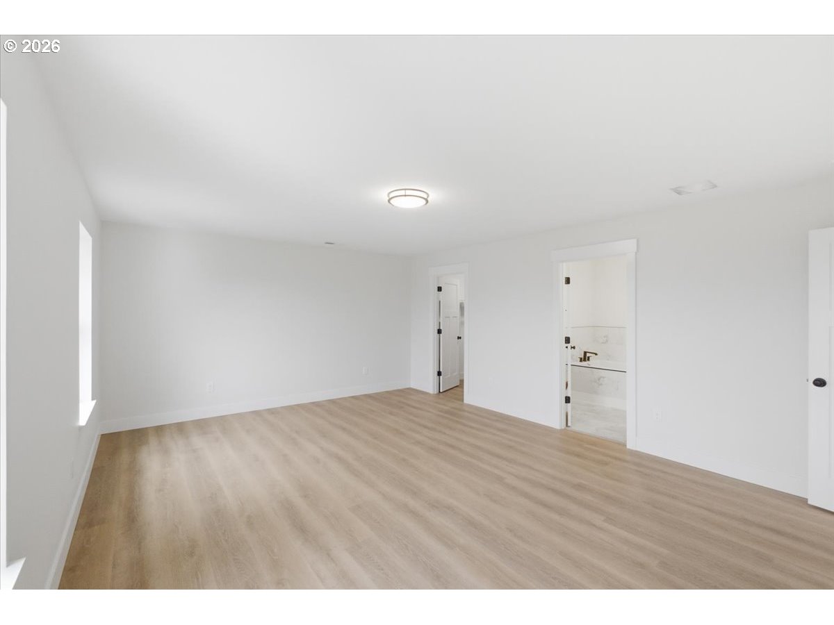 3191 Northwest 23rd Avenue Albany, OR 97321 - Photo 23 of 47 a view of an empty room and wooden floor