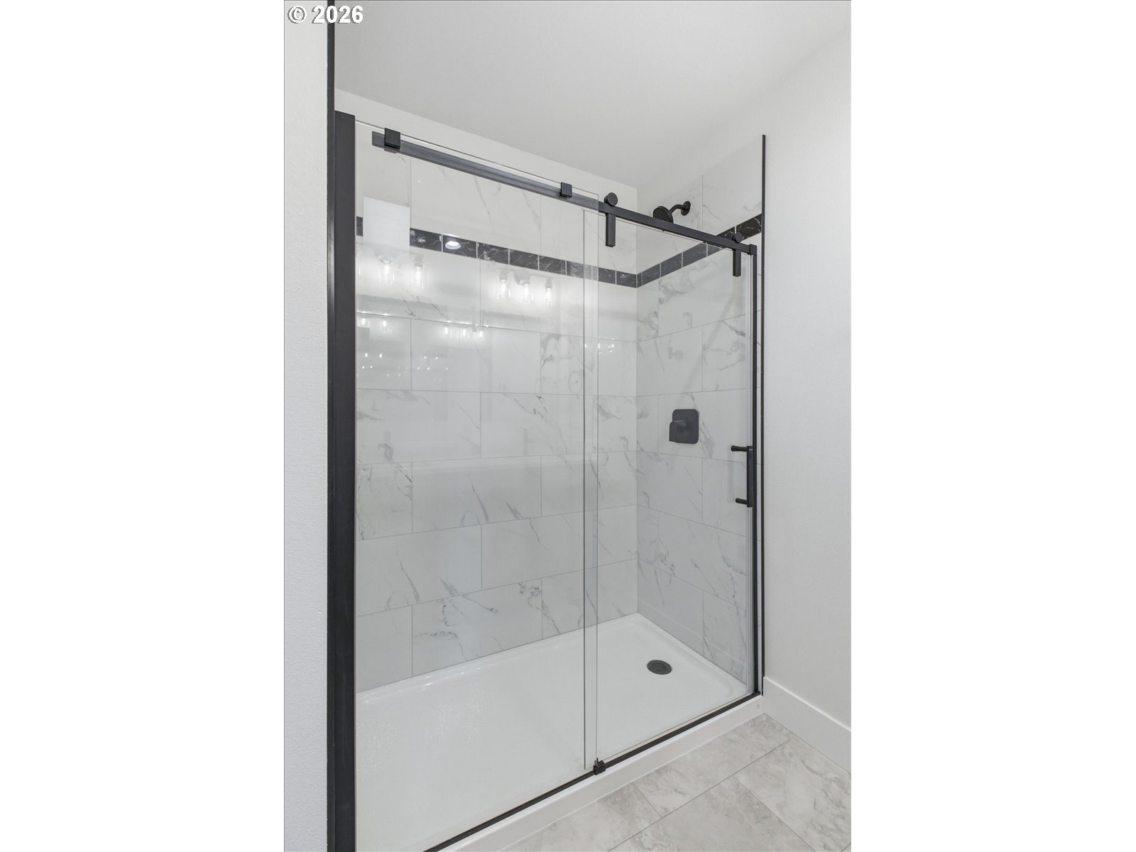 3191 Northwest 23rd Avenue Albany, OR 97321 - Photo 26 of 47 a bathroom with a shower and a glass door