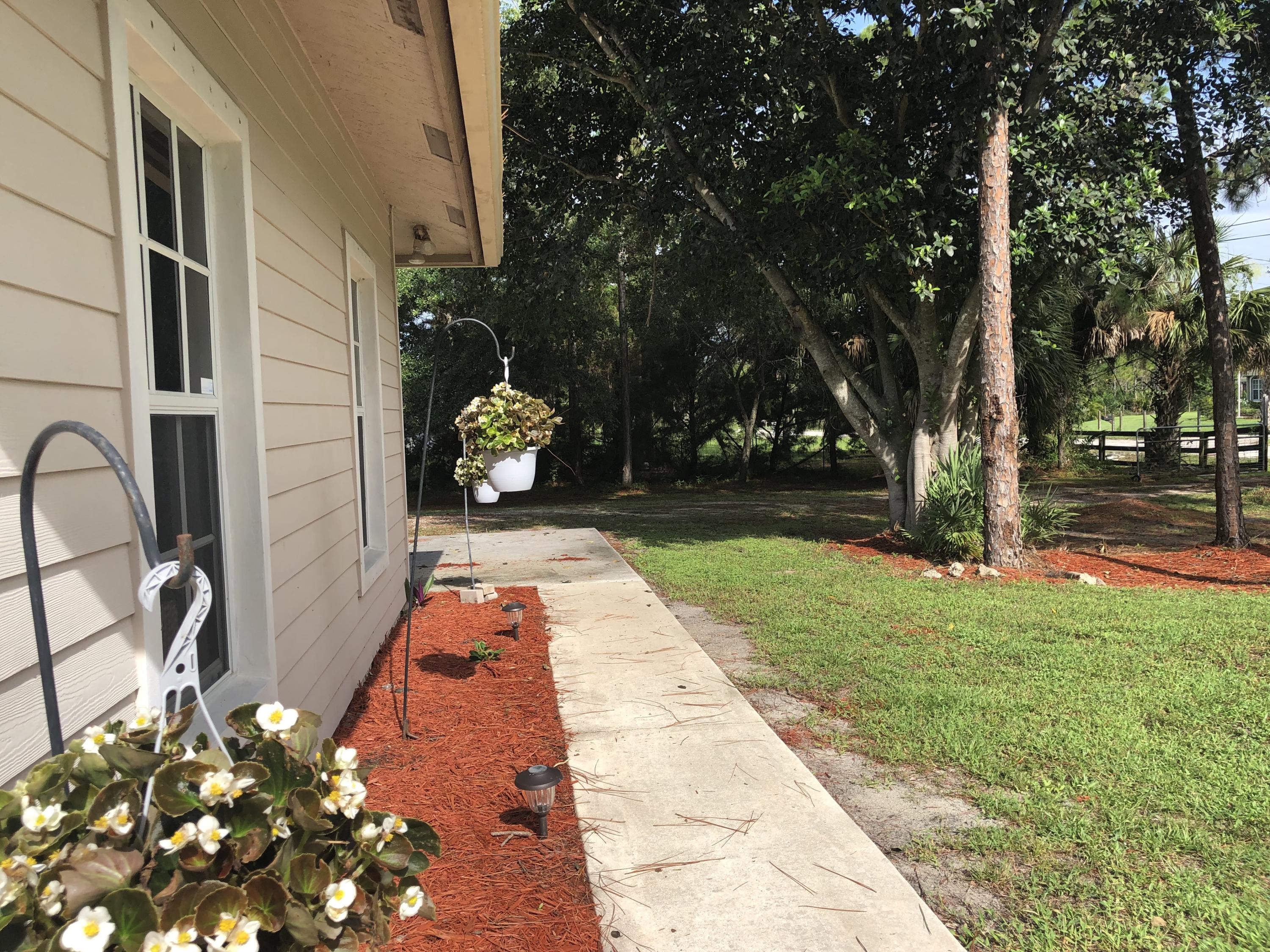 16608 72nd Road North Loxahatchee, FL 33470 - Photo 15 of 77 OqT%YjGKQP+kJgiY+DTwAg