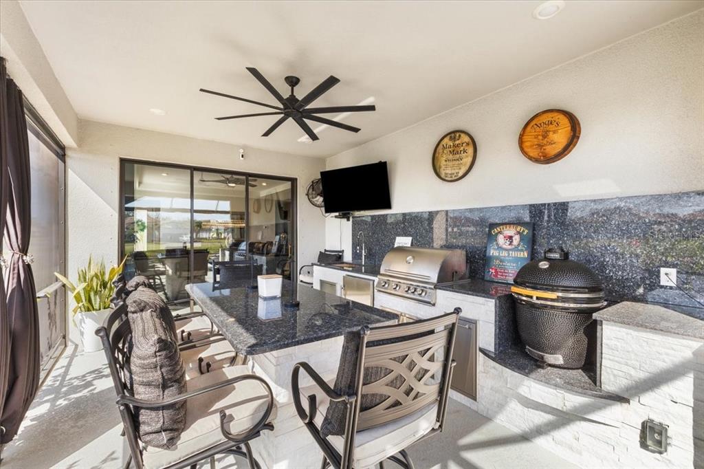 4760 Crestpoint Way Palmetto, FL 34221 - Photo 25 of 44 a dining room with a table and chairs