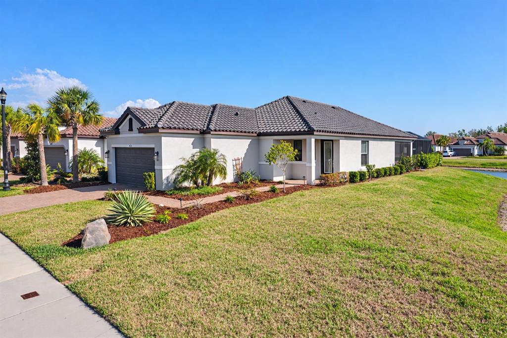 4760 Crestpoint Way Palmetto, FL 34221 - Photo 3 of 44 a view of a house with a outdoor space