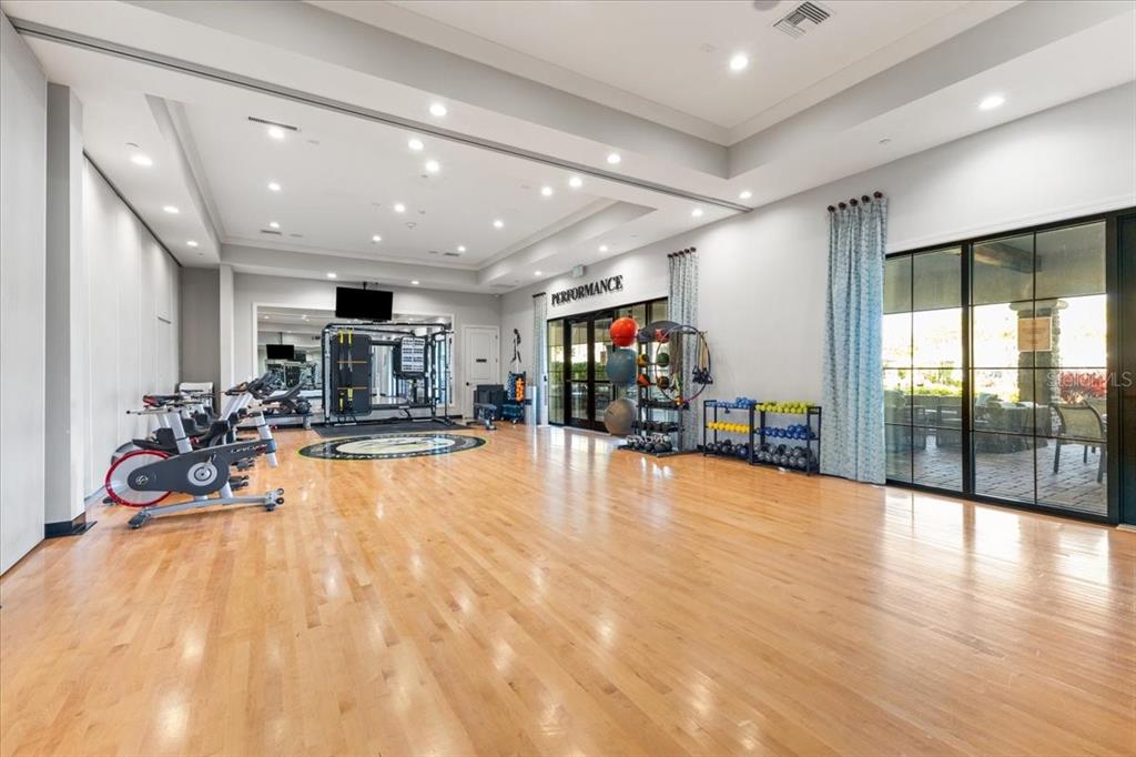 4760 Crestpoint Way Palmetto, FL 34221 - Photo 34 of 44 a view of a room with gym equipment