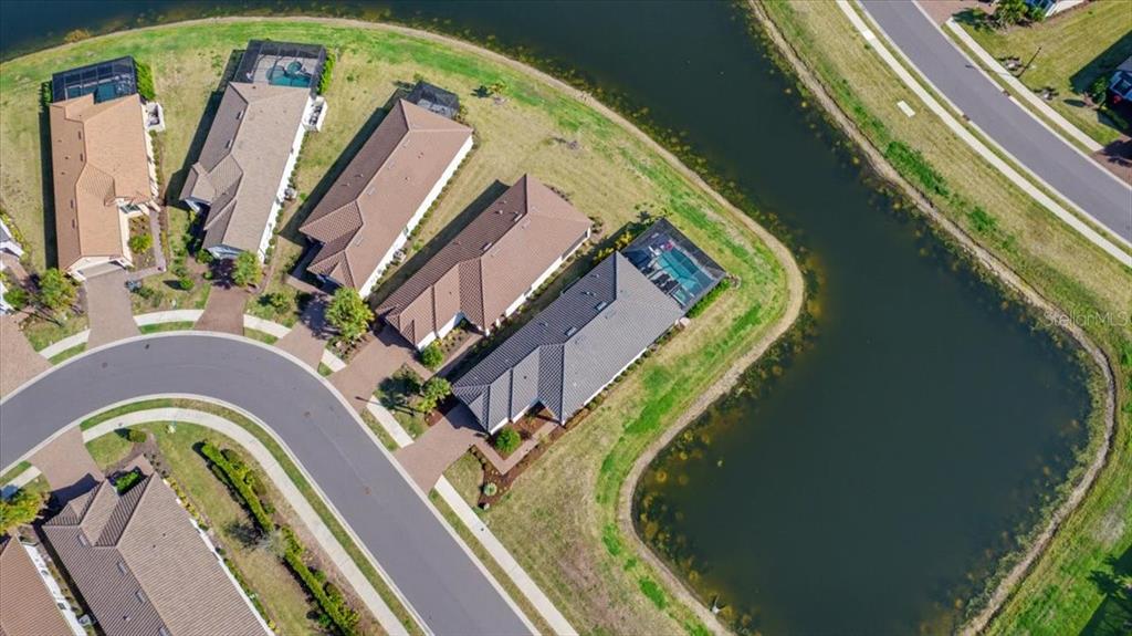 4760 Crestpoint Way Palmetto, FL 34221 - Photo 4 of 44 a view of swimming pool with a balcony