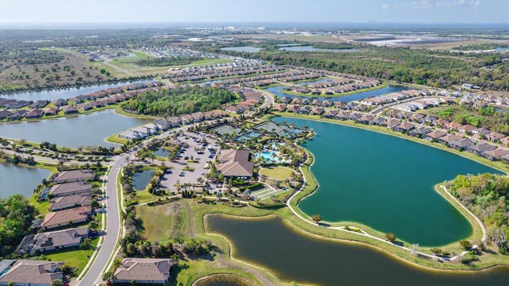 4760 Crestpoint Way Palmetto, FL 34221 - Photo 41 of 44 an aerial view of a house with a lake view