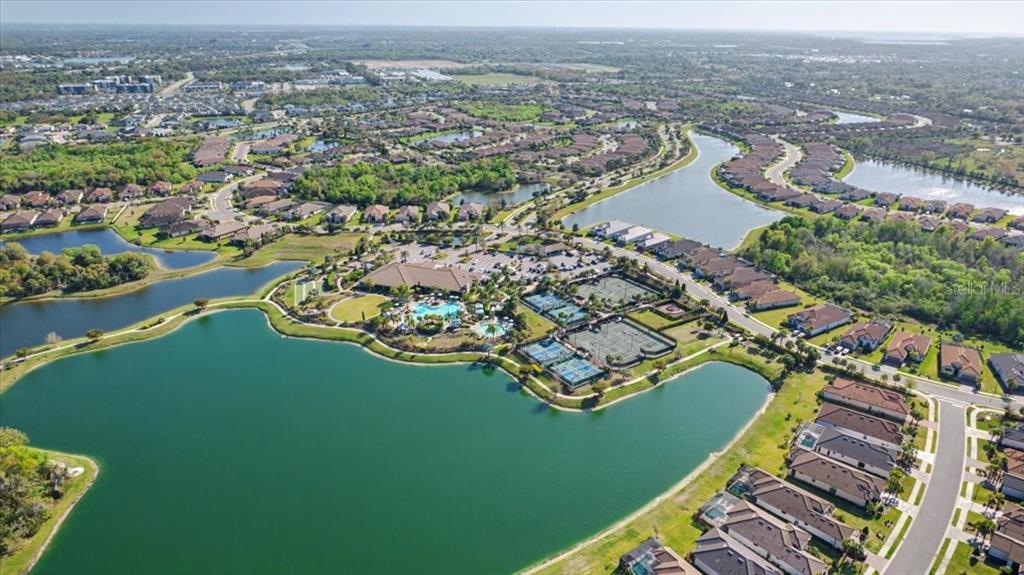4760 Crestpoint Way Palmetto, FL 34221 - Photo 42 of 44 an aerial view of a house with a lake view