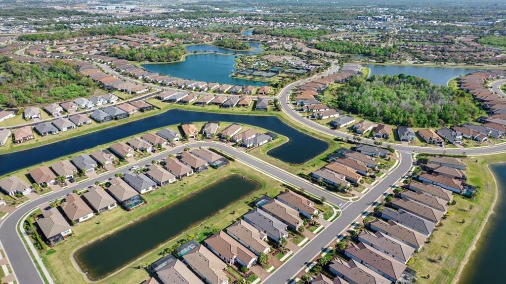 4760 Crestpoint Way Palmetto, FL 34221 - Photo 6 of 44 a view of a city from a balcony