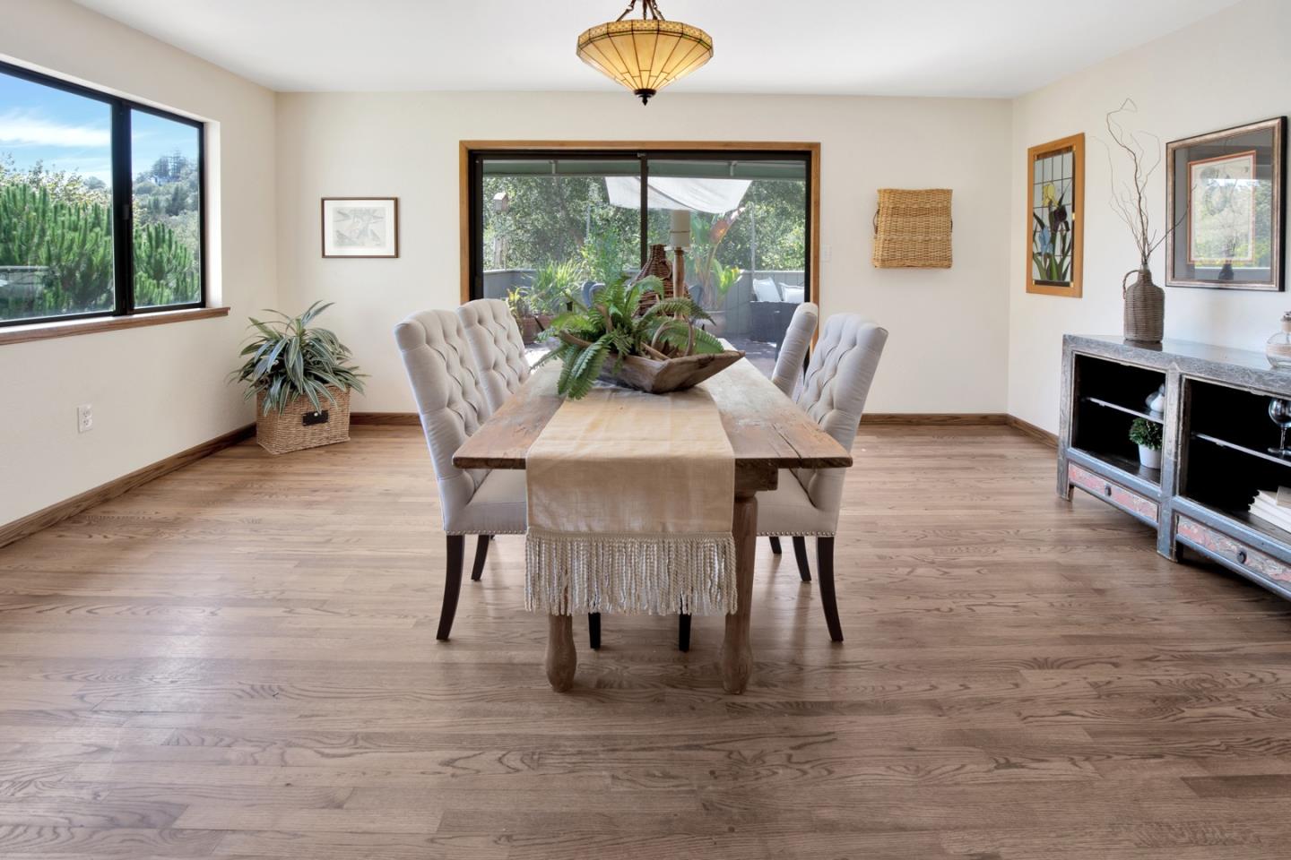 560 Hidden Valley Road Soquel, CA 95073 - Photo 18 of 59 a view of a dining room with furniture window and outside view