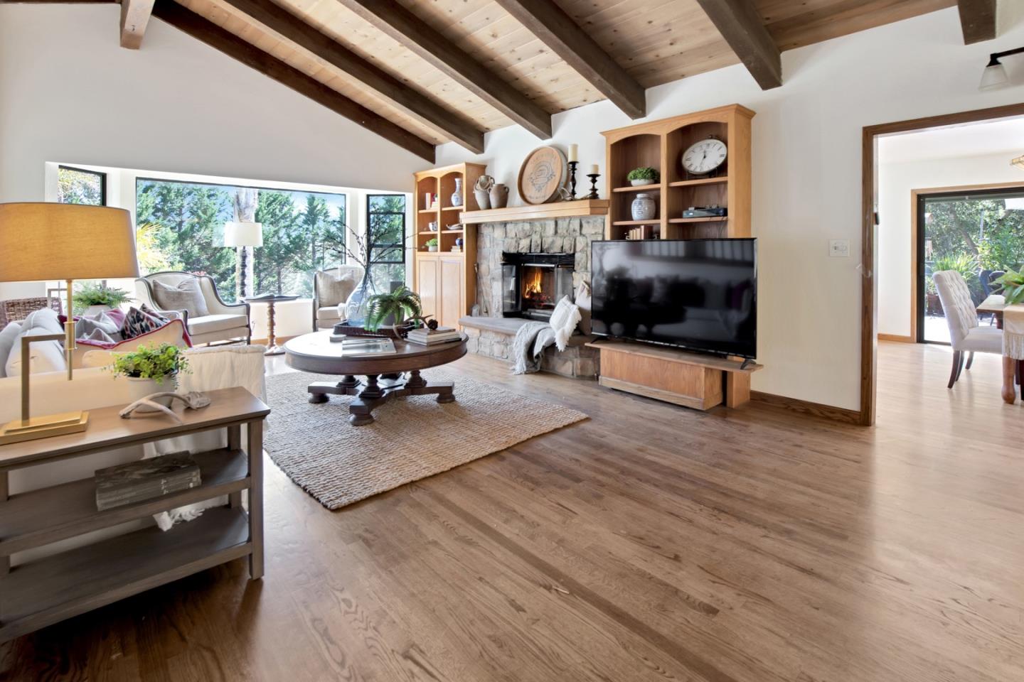 560 Hidden Valley Road Soquel, CA 95073 - Photo 20 of 59 a living room with furniture fireplace and flat screen tv