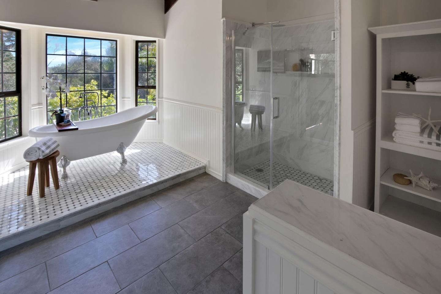 560 Hidden Valley Road Soquel, CA 95073 - Photo 22 of 59 a spacious bathroom with a granite countertop bathtub next to a window