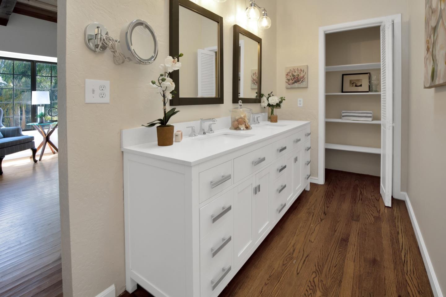 560 Hidden Valley Road Soquel, CA 95073 - Photo 23 of 59 a bathroom with double vanity sink and a mirror