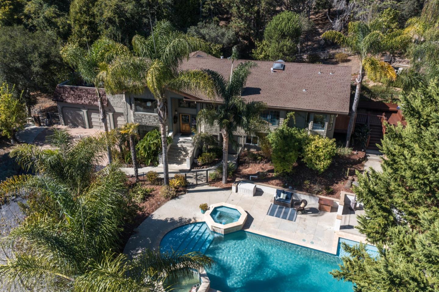 560 Hidden Valley Road Soquel, CA 95073 - Photo 3 of 59 an aerial view of house with yard and outdoor seating