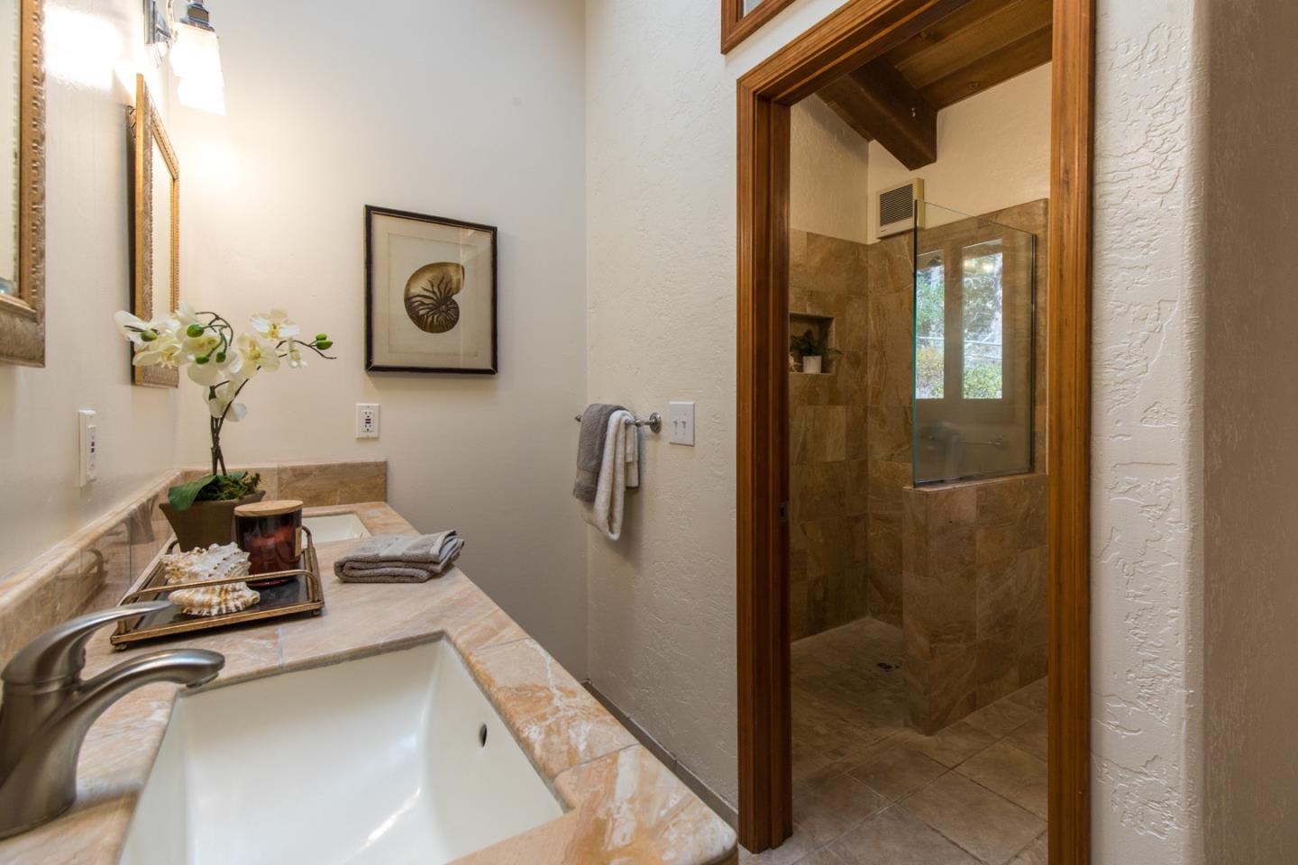 560 Hidden Valley Road Soquel, CA 95073 - Photo 31 of 59 a bathroom with a tub and shower