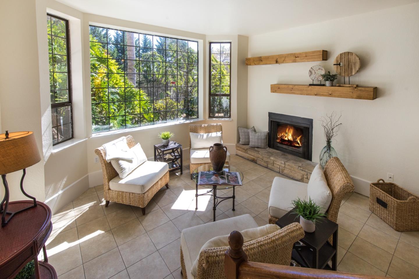 560 Hidden Valley Road Soquel, CA 95073 - Photo 32 of 59 a living room with furniture and a fireplace