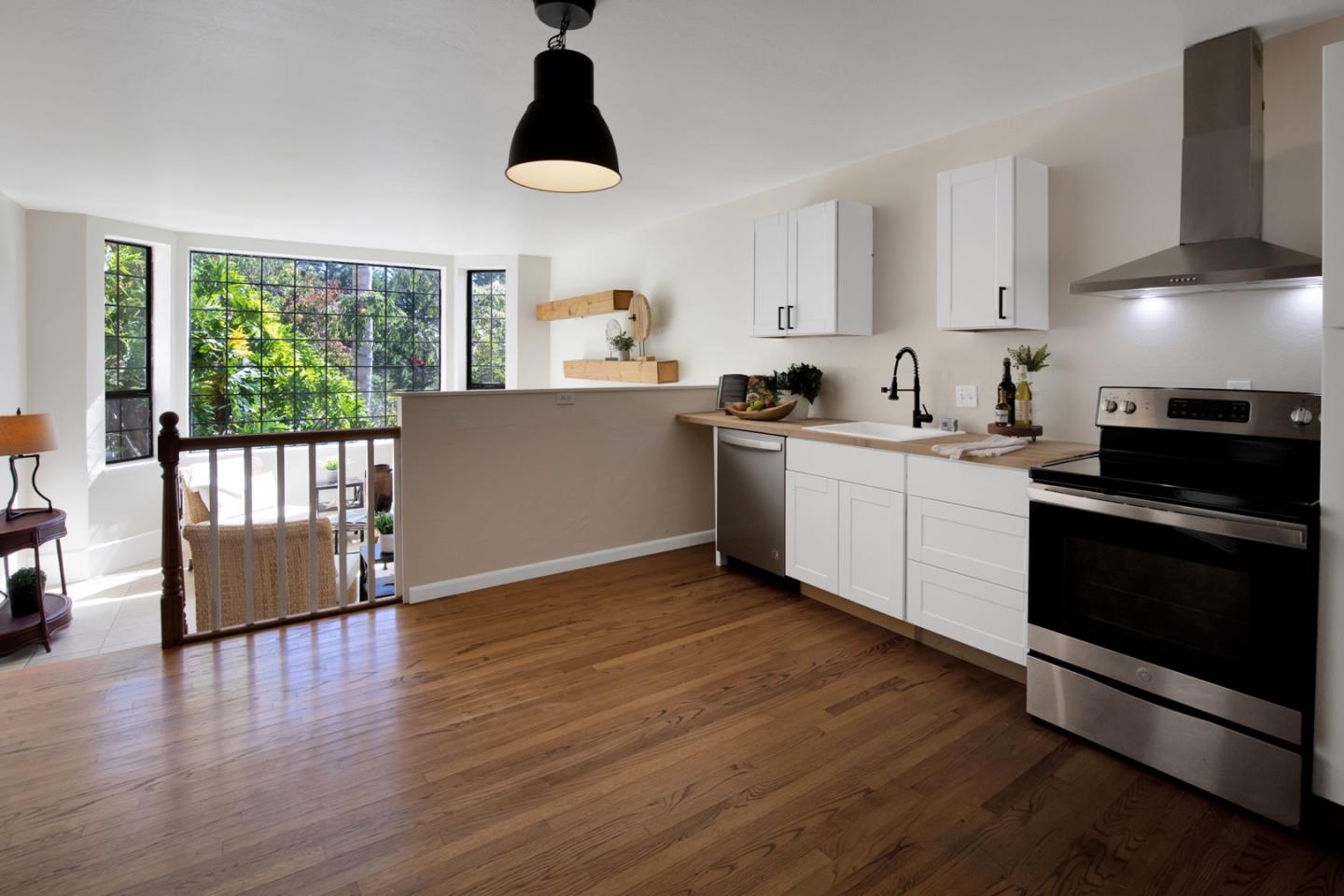 560 Hidden Valley Road Soquel, CA 95073 - Photo 37 of 59 a kitchen with stainless steel appliances granite countertop a stove a sink and a refrigerator
