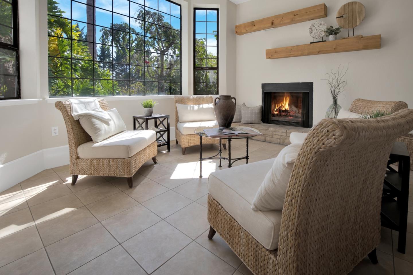560 Hidden Valley Road Soquel, CA 95073 - Photo 40 of 59 a living room with furniture and a fireplace