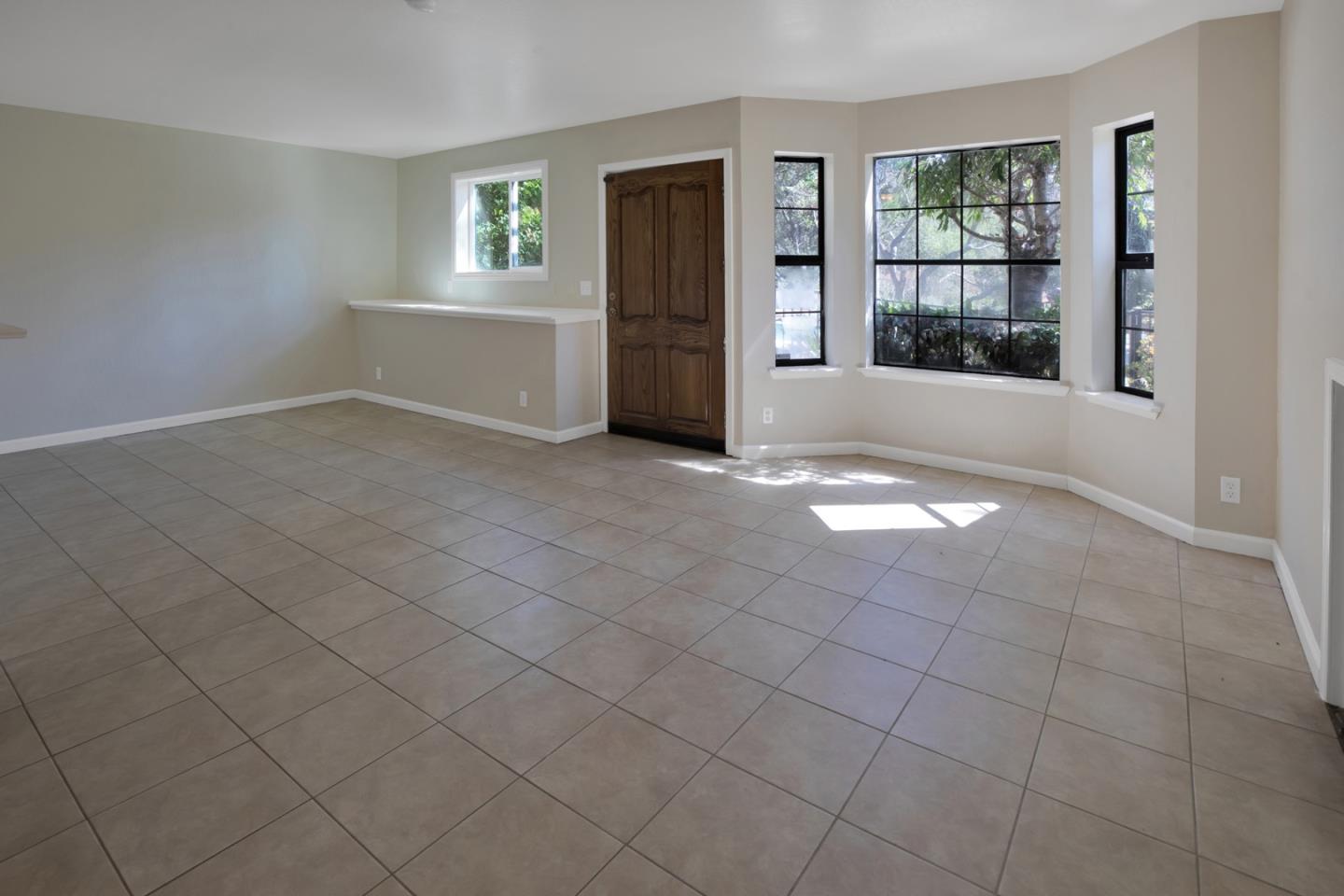 560 Hidden Valley Road Soquel, CA 95073 - Photo 45 of 59 an empty room with windows and closet