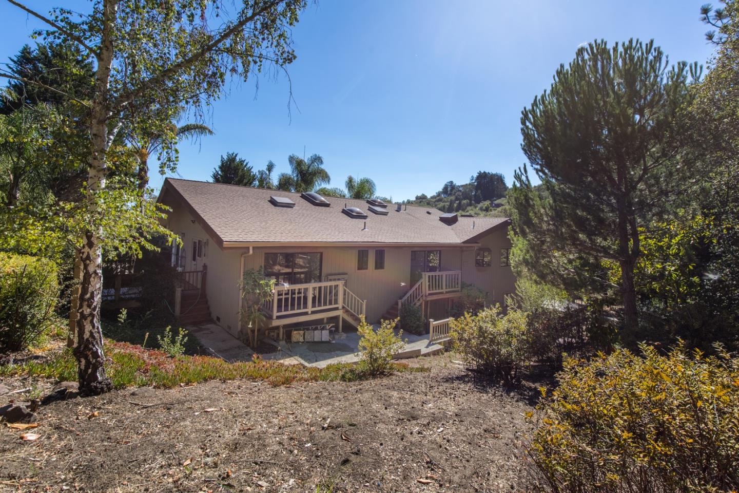 560 Hidden Valley Road Soquel, CA 95073 - Photo 47 of 59 a front view of a house with garden