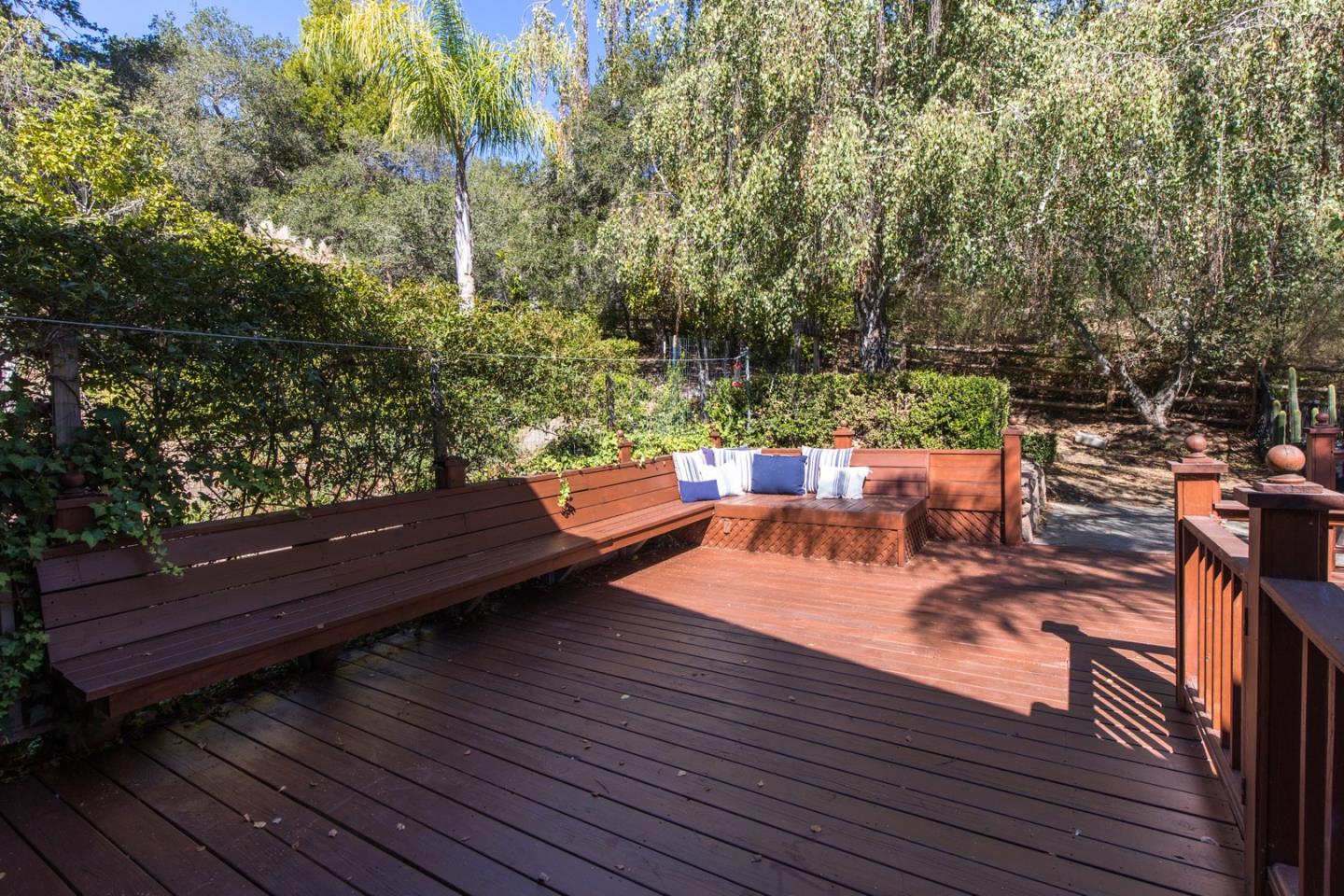 560 Hidden Valley Road Soquel, CA 95073 - Photo 51 of 59 a view of a wooden deck with furniture