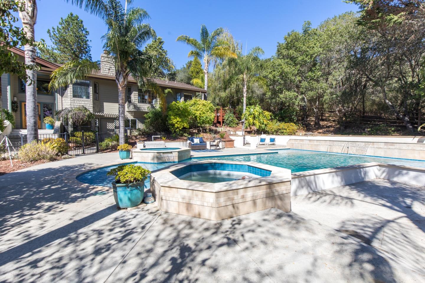 560 Hidden Valley Road Soquel, CA 95073 - Photo 57 of 59 a view of a swimming pool with a patio